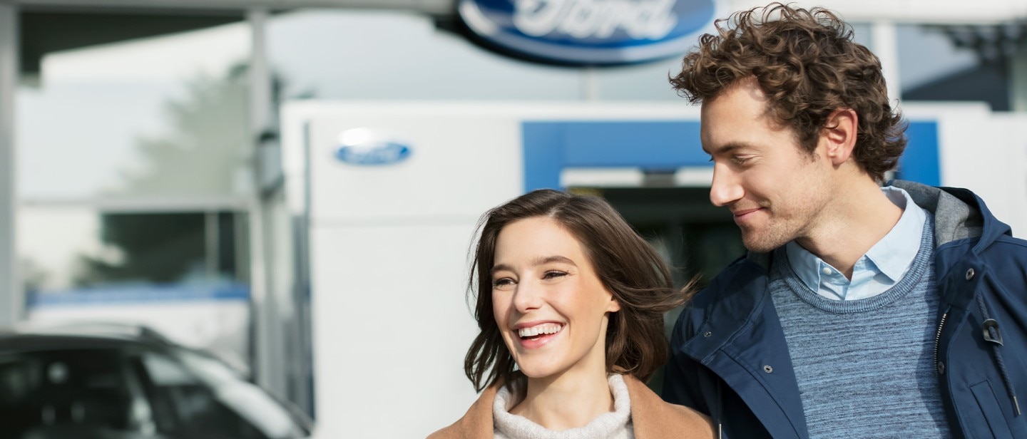 Ford Servicing Eu Happy Couple 21X9 2160X925 Bb Customer Couple Happily Walking Away From Dealership New.Jpg.Renditions.Original